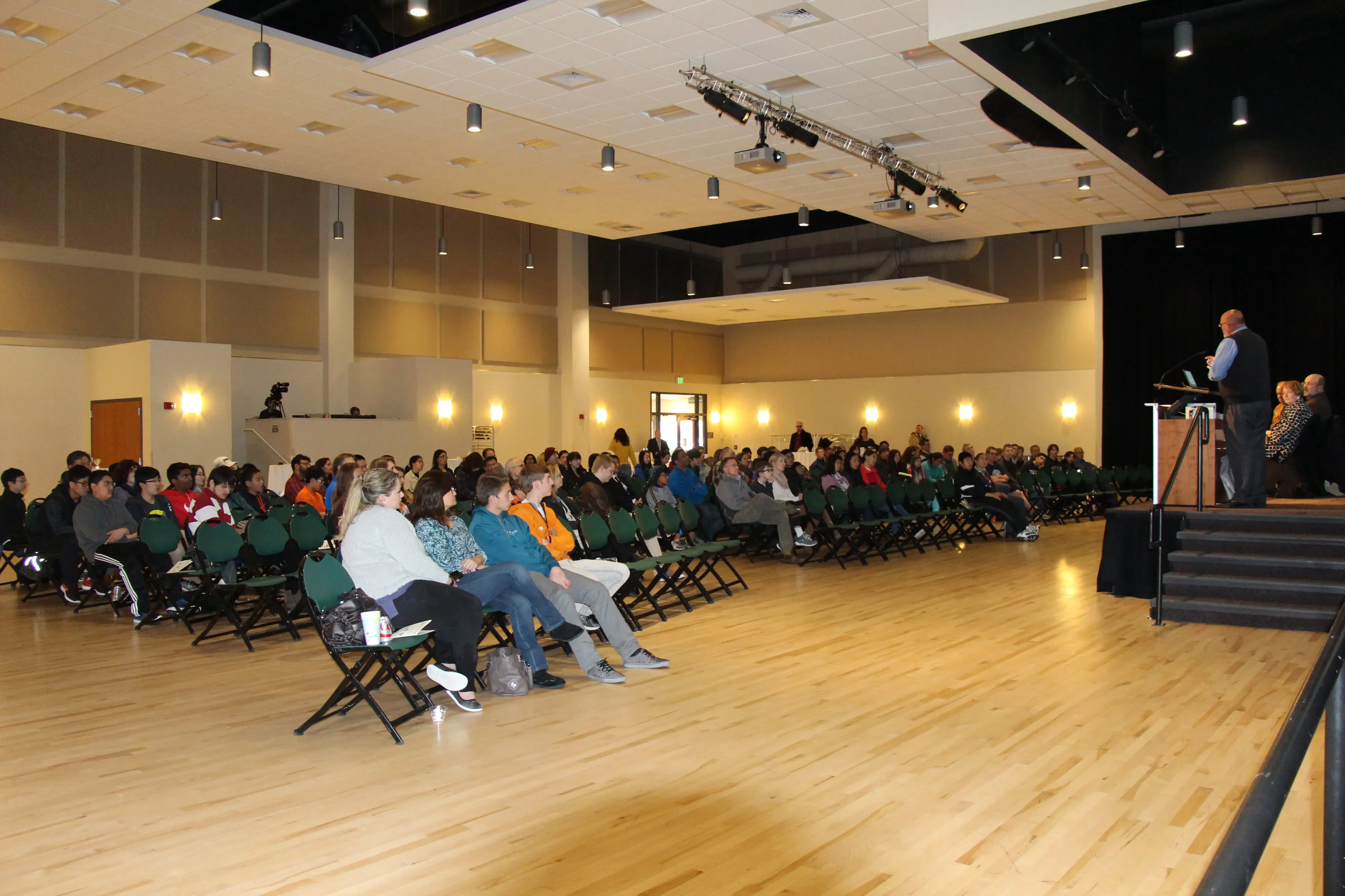 The Olympiad crowd watching a speaker